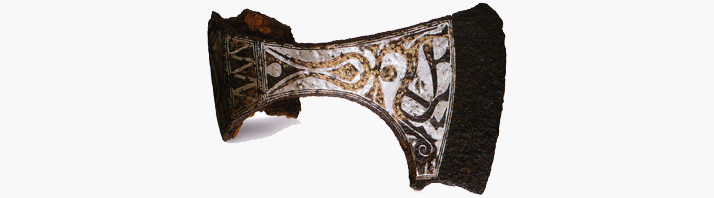 Топорик из  Булгарии. XIII век. Инкрустация серебром по железу.